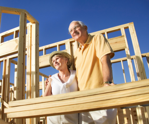 Old couple building a new house