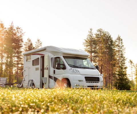 Photo of an rv out in the woods