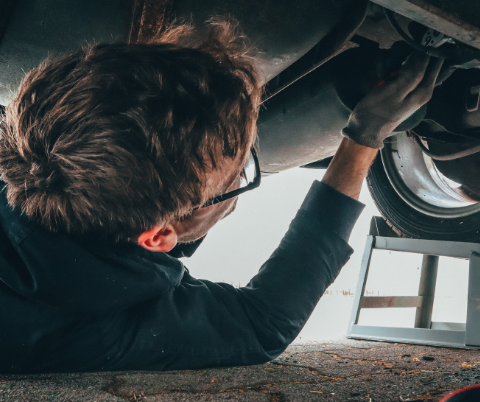 mechanic repairing car