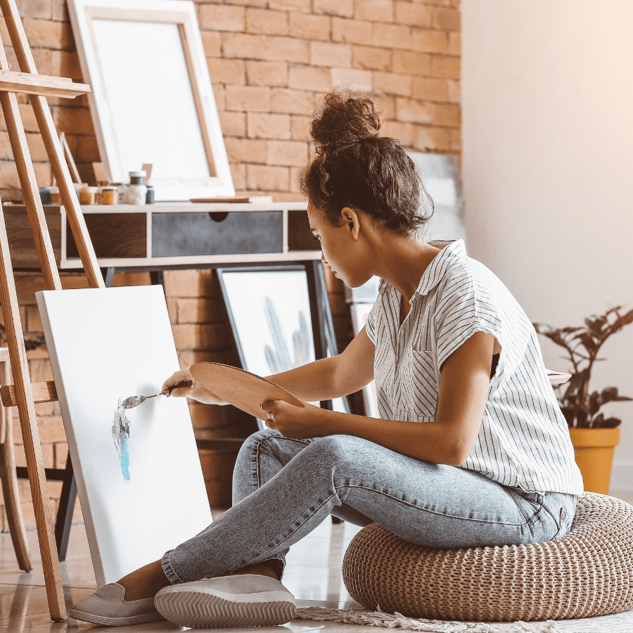 Young woman painting