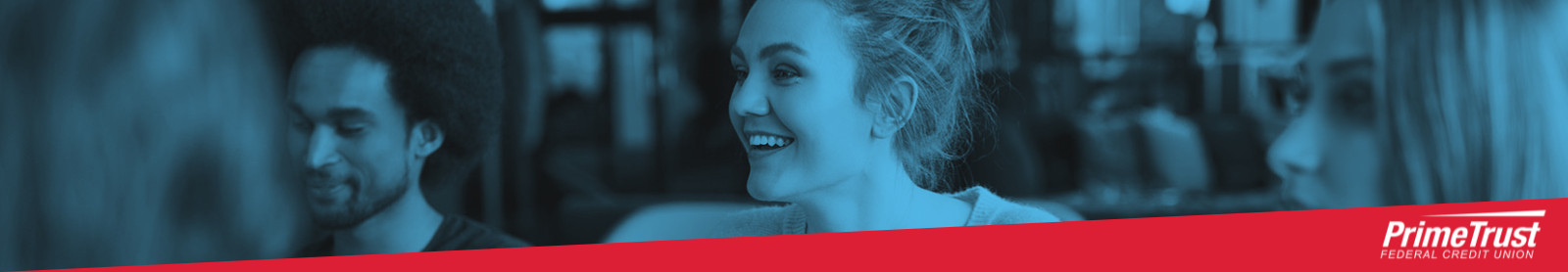 Header image of several PrimeTrust members smiling.